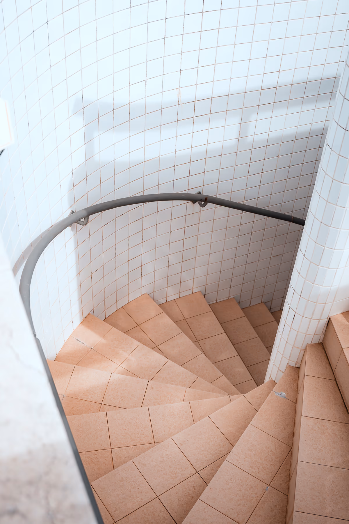 Tiled spiral staircase seen from above